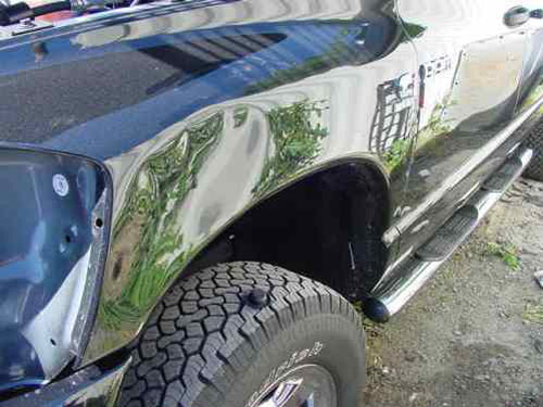 grey truck auto body repair before